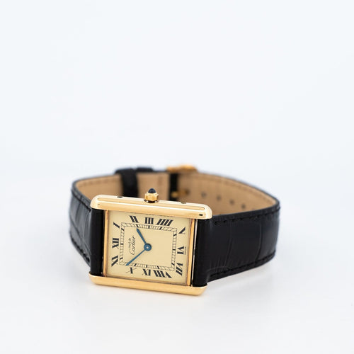 Montre Cartier - Montre Tank Must LM à cadran romain jaune citron 58 Facettes 583