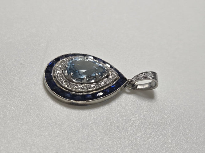 Pendentif Pendentif en or blanc avec aigue-marine, saphirs et diamants 58 Facettes Bague_009