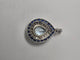 Pendentif Pendentif en or blanc avec aigue-marine, saphirs et diamants 58 Facettes Bague_009