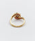 Bague 46 Bague tourbillon en or 18k, diamant et rubis, vers 1920 58 Facettes A08114