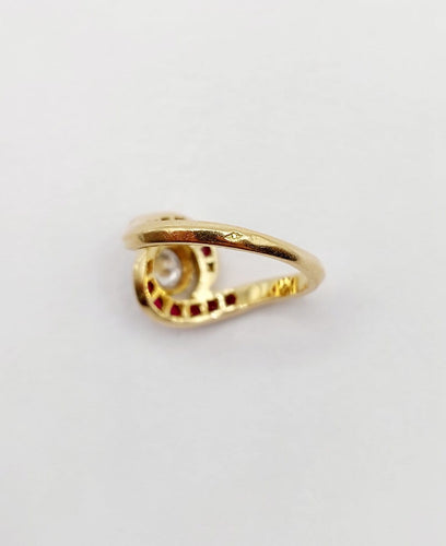 Bague 46 Bague tourbillon en or 18k, diamant et rubis, vers 1920 58 Facettes A08114