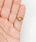 Bague 46 Bague tourbillon en or 18k, diamant et rubis, vers 1920 58 Facettes A08114