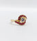 Bague 46 Bague tourbillon en or 18k, diamant et rubis, vers 1920 58 Facettes A08114