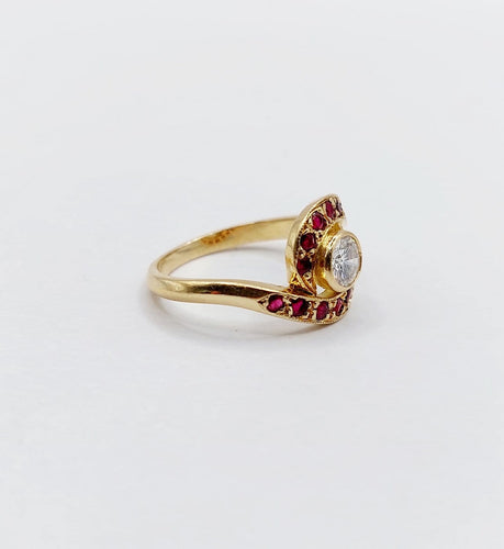 Bague 46 Bague tourbillon en or 18k, diamant et rubis, vers 1920 58 Facettes A08114