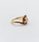 Bague 46 Bague tourbillon en or 18k, diamant et rubis, vers 1920 58 Facettes A08114