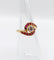Bague 46 Bague tourbillon en or 18k, diamant et rubis, vers 1920 58 Facettes A08114