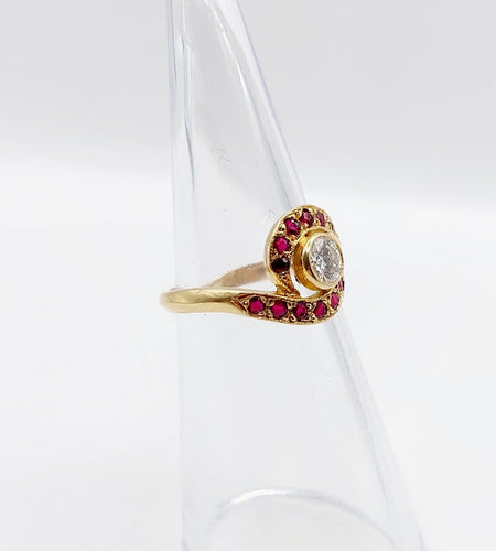 Bague 46 Bague tourbillon en or 18k, diamant et rubis, vers 1920 58 Facettes A08114