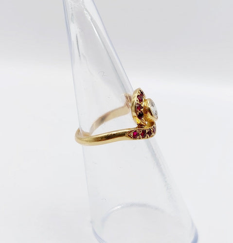 Bague 46 Bague tourbillon en or 18k, diamant et rubis, vers 1920 58 Facettes A08114