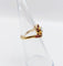 Bague 46 Bague tourbillon en or 18k, diamant et rubis, vers 1920 58 Facettes A08114