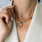 https://cdn.shopify.com/s/files/1/0940/1971/5447/files/Collier_Cartier_trois_ors_port.jpg?v=1793053577