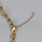 https://cdn.shopify.com/s/files/1/0940/1971/5447/files/Collier_Cartier_attache_du_motif.jpg?v=1793053667
