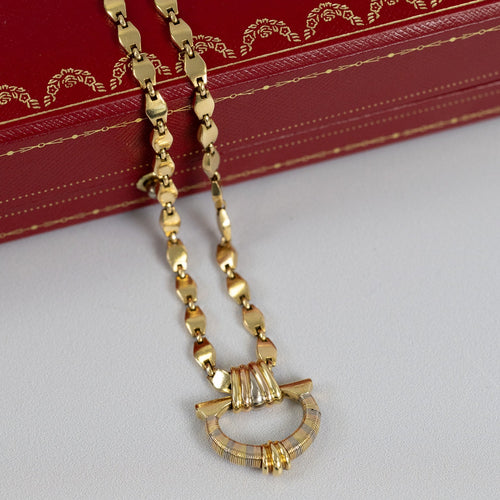 https://cdn.shopify.com/s/files/1/0940/1971/5447/files/Collier_Cartier_trois_ors_vue_d_ensemble.jpg?v=1793053319