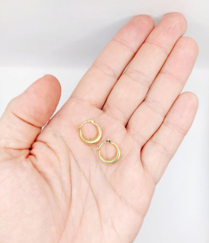 Boucles d'oreilles Créoles vintage en or 14k 58 Facettes A08127