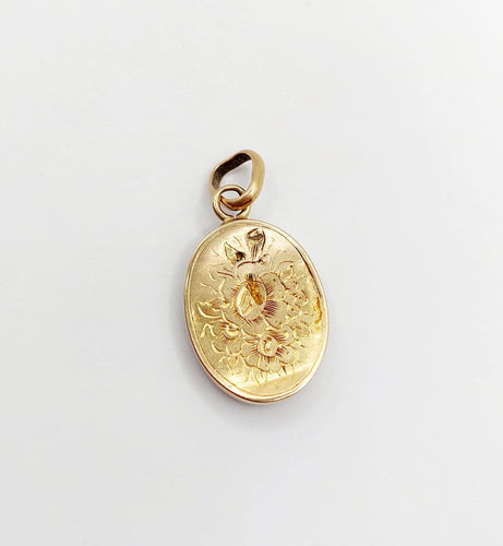 Pendentif Pendentif reliquaire en or 18k, mèche de cheveux et perles, vers 1890 58 Facettes A08132