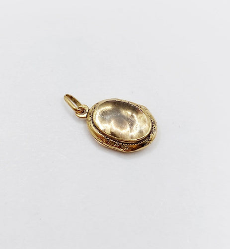 Pendentif Pendentif reliquaire ancien en or 18k, vers 1900 58 Facettes A08133