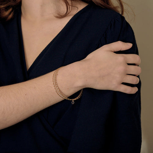 Bracelet Bracelet triple jonc ancien en or jaune 18k 58 Facettes BR3joncs
