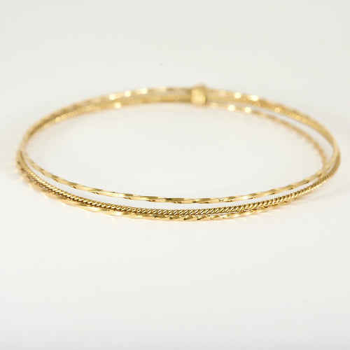 Bracelet Bracelet triple jonc ancien en or jaune 18k 58 Facettes BR3joncs