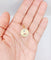 Pendentif Augis - Pendentif médaille d'amour en or rose 18k, rubis, vers 1970 58 Facettes A08140
