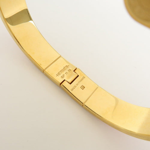 Bracelet Hermès - Bracelet Charnière Uni en métal et émail doré 58 Facettes qspt2ekaw9