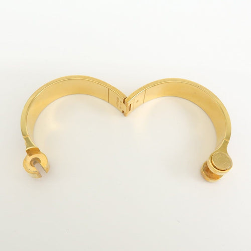 Bracelet Hermès - Bracelet Charnière Uni en métal et émail doré 58 Facettes qspt2ekaw9
