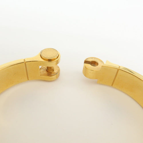Bracelet Hermès - Bracelet Charnière Uni en métal et émail doré 58 Facettes qspt2ekaw9