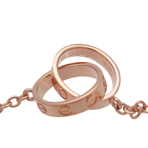 Collier Cartier - Collier Love Interlocking en or rose 18k 58 Facettes ljagcymb1p