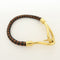 Bracelet Hermès - Bracelet Jumbo Hook en cuir tressé et métal 58 Facettes e24u36e4eb