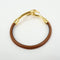 Bracelet Hermès - Bracelet Jumbo Hook en cuir tressé et métal 58 Facettes fwy4gu9vah