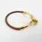 Bracelet Hermès - Bracelet Jumbo Hook en cuir tressé et métal 58 Facettes fwy4gu9vah