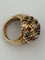 Bague 52 Bague dôme en or jaune 18k, rubis, saphirs, émeraudes et diamants 58 Facettes LOT 7906