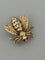 Broche Broche abeille en or jaune 18k, diamants et rubis 58 Facettes LOT 7886
