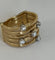 Bague 52.5 Marco Bicego - Bague bandeau en or jaune et gris 18k, diamants 58 Facettes LOT 7843