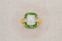 Bague Bague octogonale en or jaune avec opale, émeraudes et diamants 58 Facettes 4232