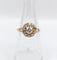 Bague marguerite ancienne en or rose 18k, diamants taille ancienne, vers 1900 58 Facettes A08005