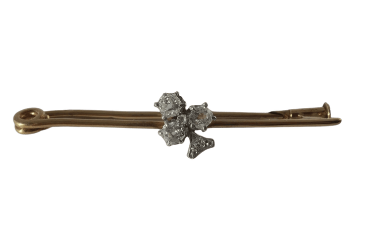 Broche Broche barrette trèfle, or jaune 18 carats, platine et diamants 0,49 ct 58 Facettes Broche
