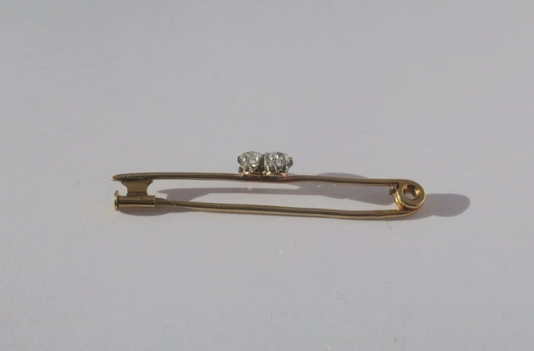 Broche Broche barrette trèfle, or jaune 18 carats, platine et diamants 0,49 ct 58 Facettes Broche