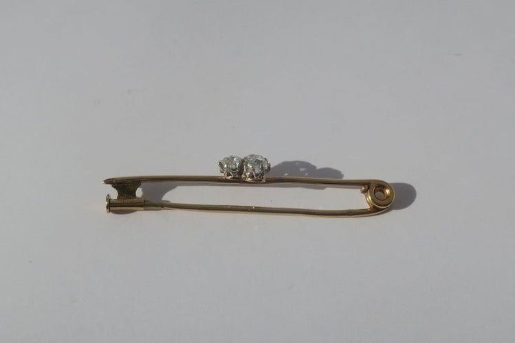 Broche Broche barrette trèfle, or jaune 18 carats, platine et diamants 0,49 ct 58 Facettes Broche