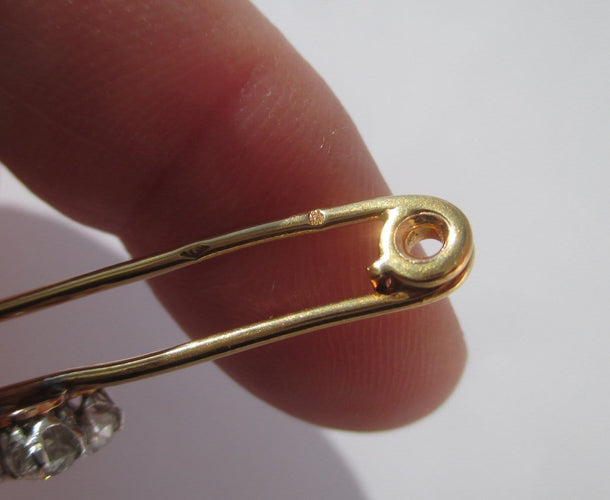 Broche Broche barrette trèfle, or jaune 18 carats, platine et diamants 0,49 ct 58 Facettes Broche