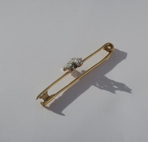 Broche Broche barrette trèfle, or jaune 18 carats, platine et diamants 0,49 ct 58 Facettes Broche