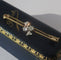 Broche Broche barrette trèfle, or jaune 18 carats, platine et diamants 0,49 ct 58 Facettes Broche