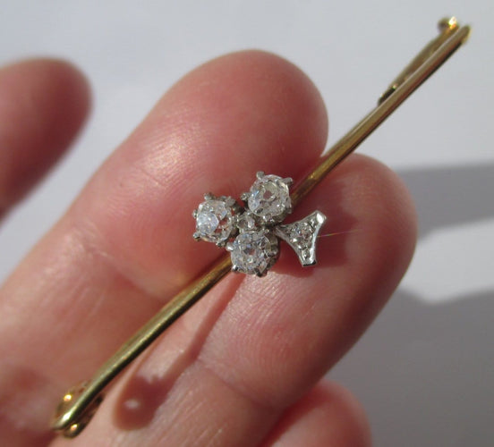 Broche Broche barrette trèfle, or jaune 18 carats, platine et diamants 0,49 ct 58 Facettes Broche