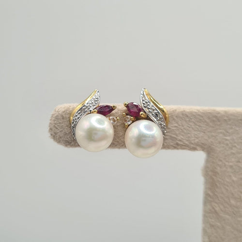 Boucles d'oreilles Boucles d’oreilles en or jaune 18k avec perle de culture 58 Facettes #5075