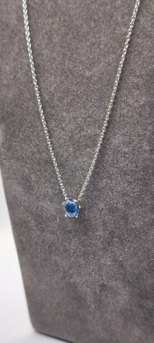 Collier Collier en or blanc 18 carats 750/1000 avec saphir cabochon bleu de Ceylan 58 Facettes 1CA0000002