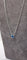 Collier Collier en or blanc 18 carats 750/1000 avec saphir cabochon bleu de Ceylan 58 Facettes 1CA0000002