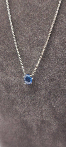 Collier Collier en or blanc 18 carats 750/1000 avec saphir cabochon bleu de Ceylan 58 Facettes 1CA0000002