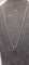 Collier Collier en or blanc 18 carats 750/1000 avec saphir cabochon bleu de Ceylan 58 Facettes 1CA0000002