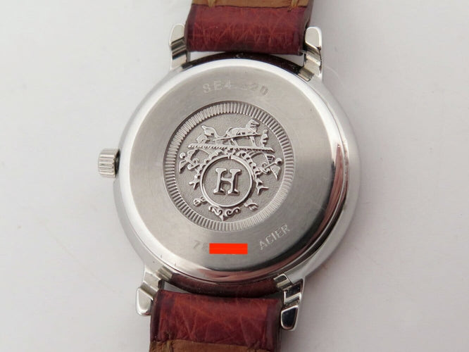 Montre Hermès - Montre Sellier à quartz, acier et plaqué or, 24 mm 58 Facettes 277751
