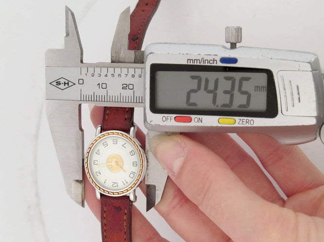 Montre Hermès - Montre Sellier à quartz, acier et plaqué or, 24 mm 58 Facettes 277751