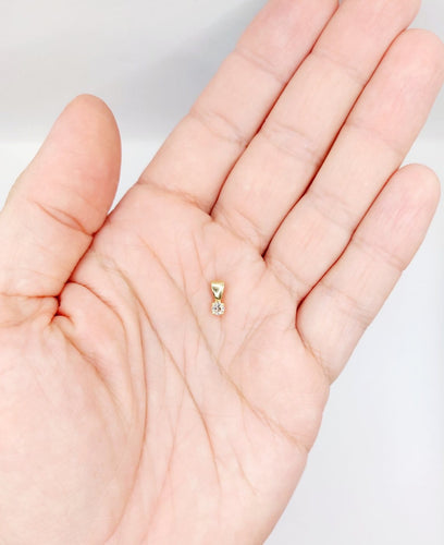 Pendentif Pendentif vintage en or 18k avec diamant de 0,14 ct 58 Facettes A04303