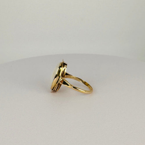 Bague 53 Bague en or jaune 14 carats et opale blanche 58 Facettes 2611001